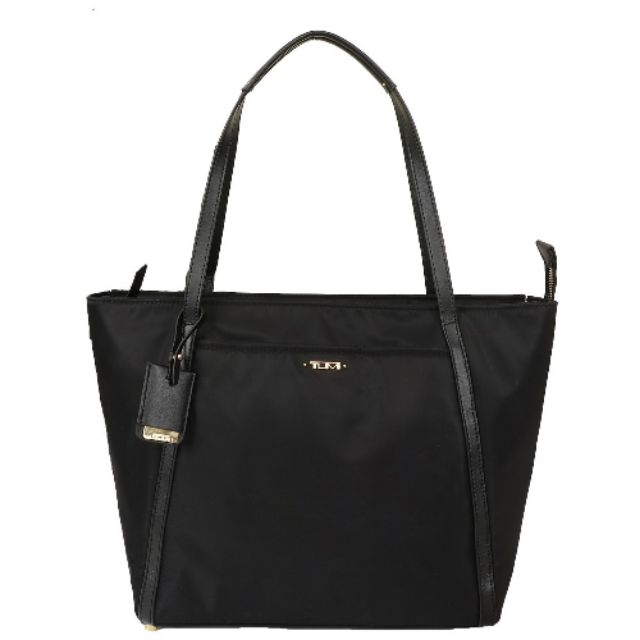 tumi ladies sling bag