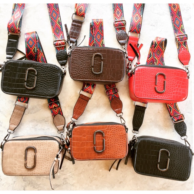 broad strap sling bag