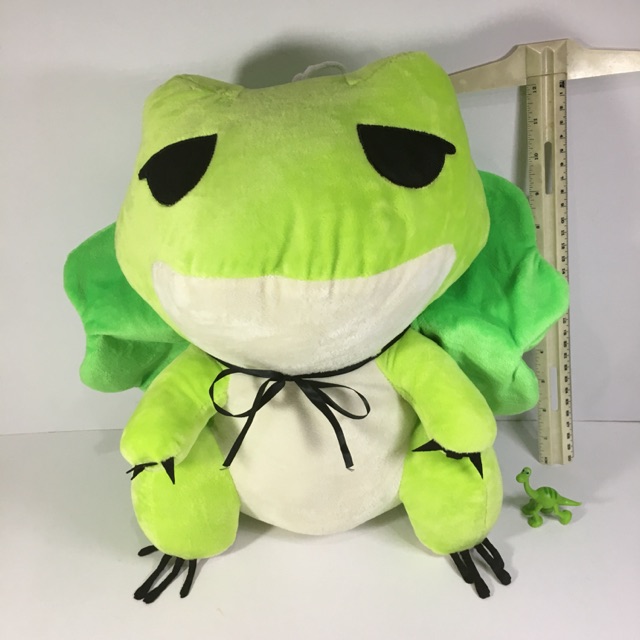 green stuffed frog