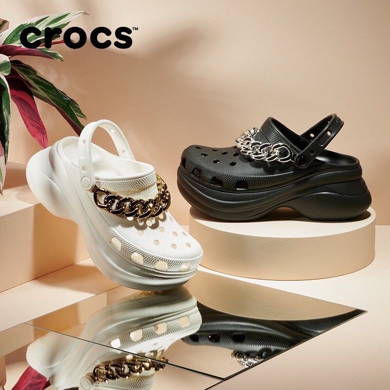 black platform crocs with chain