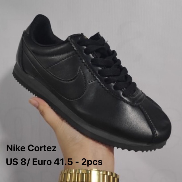 all black leather cortez