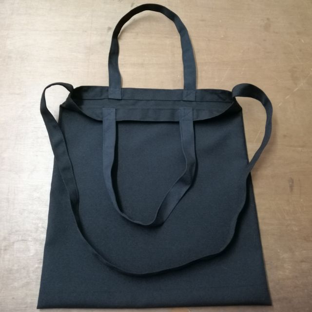 black tote bag with long strap