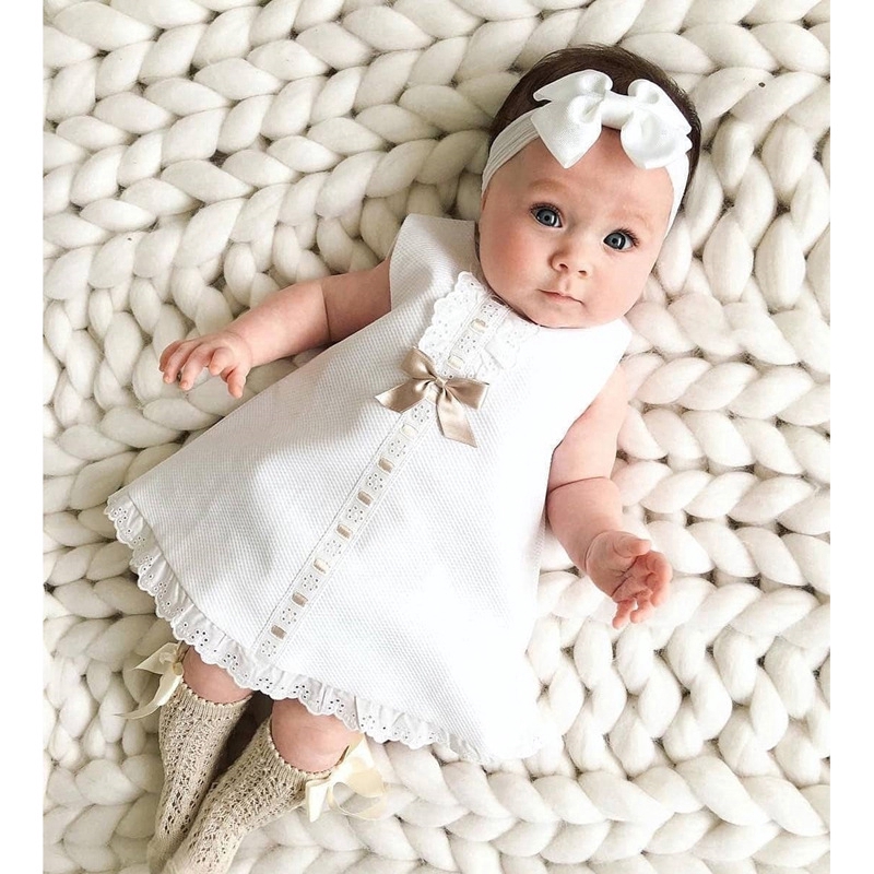 girls white sleeveless dress