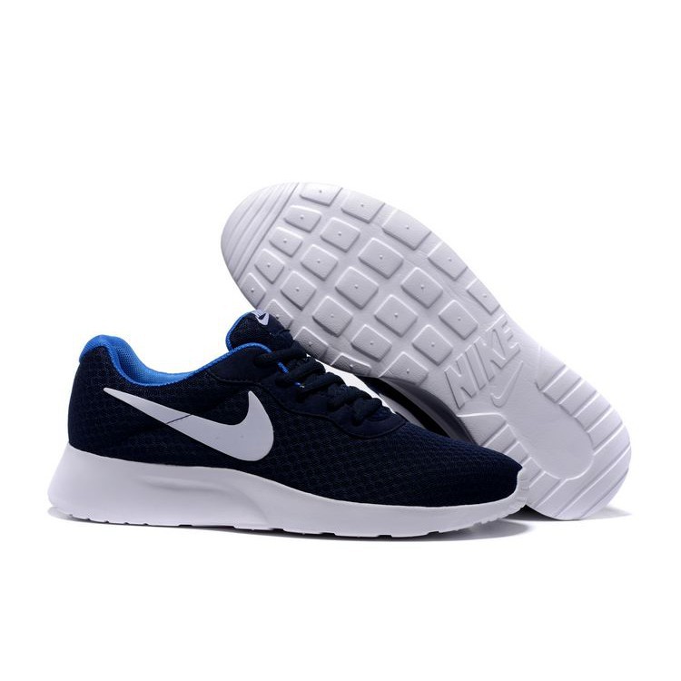 light blue nike tanjun