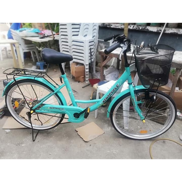 mint green bike with basket