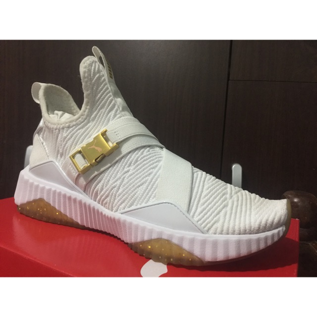 puma defy mid sg
