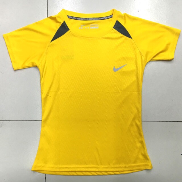 navy blue and neon green nike shirt