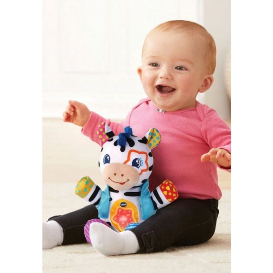 vtech lights and stripes zebra stufftoy battery operated musical toy