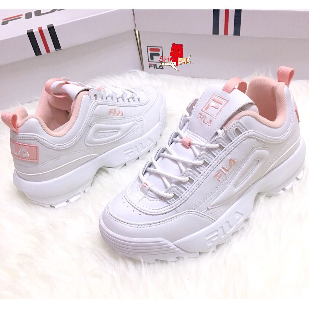 white and pink fila shoes