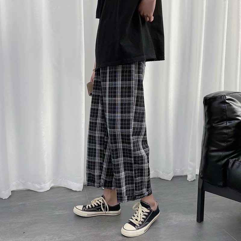 gray and black plaid pants