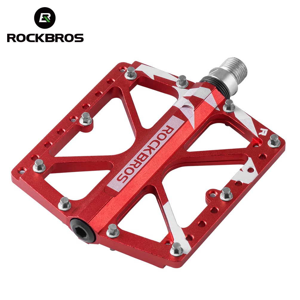 red metal bike pedals