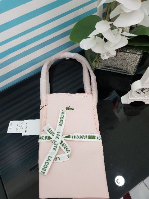 lacoste virtual pink clutch bag