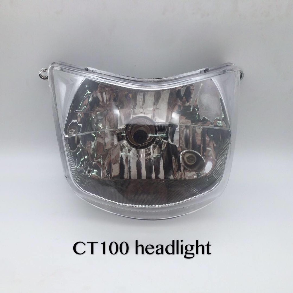 ct 100 headlight cover