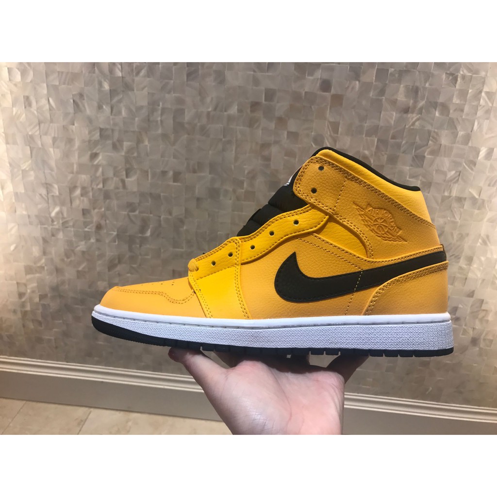 yellow black white jordan 1