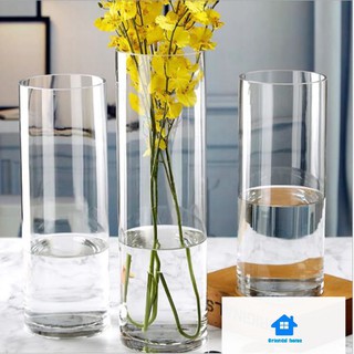 tall glass vase with flowers