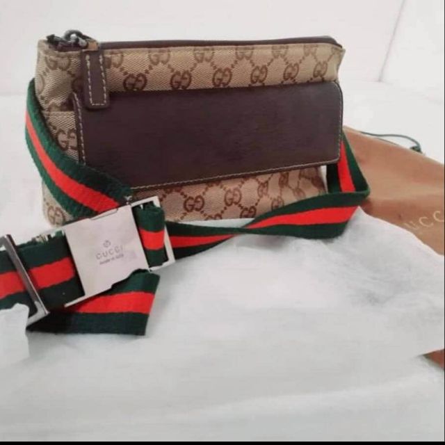harga pouch gucci original