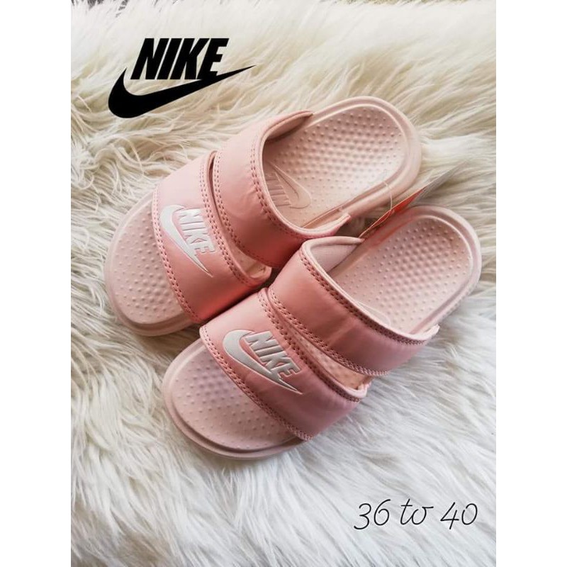 peach nike slides