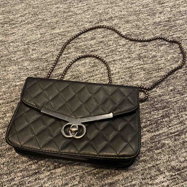 black quilted sling bag