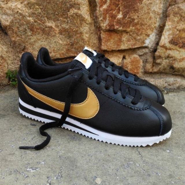 nike black and gold cortez