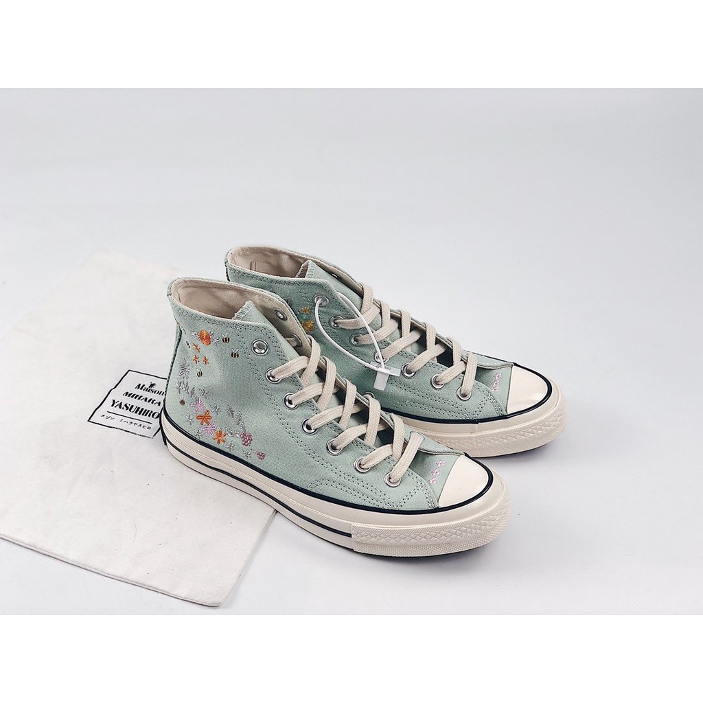 mint green canvas shoes