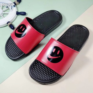 nike slides with smiley face