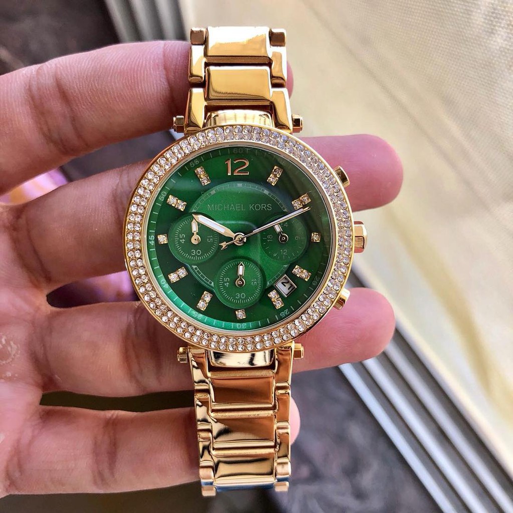 mk parker watch gold