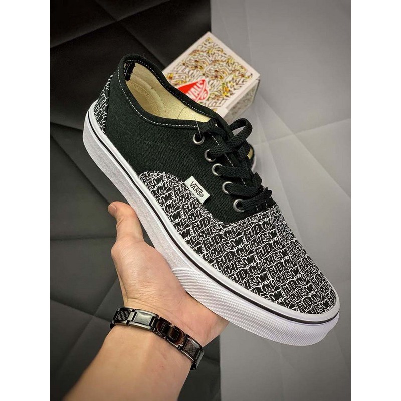 vans black low tops