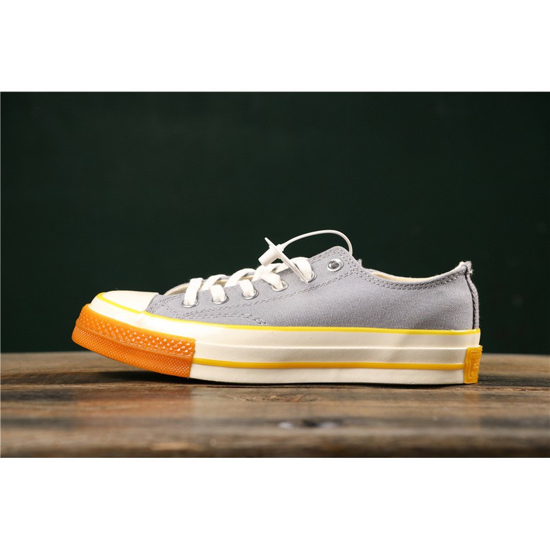 orange converse low tops mens