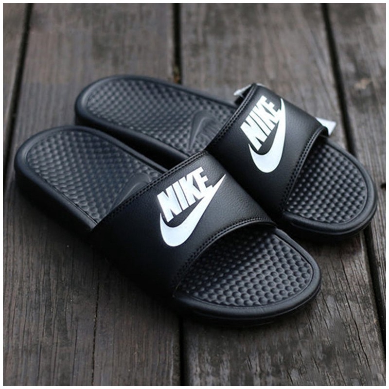 nike sandals black and gold