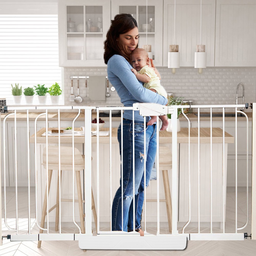 white plastic baby gate