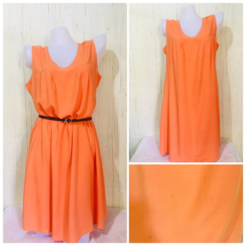 orange sleeveless dress