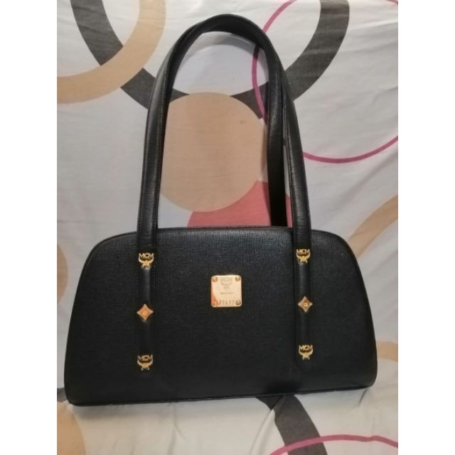 black and gold mcm bag