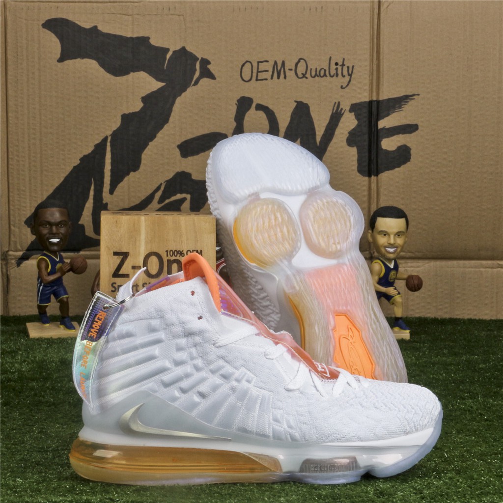 white and orange lebrons