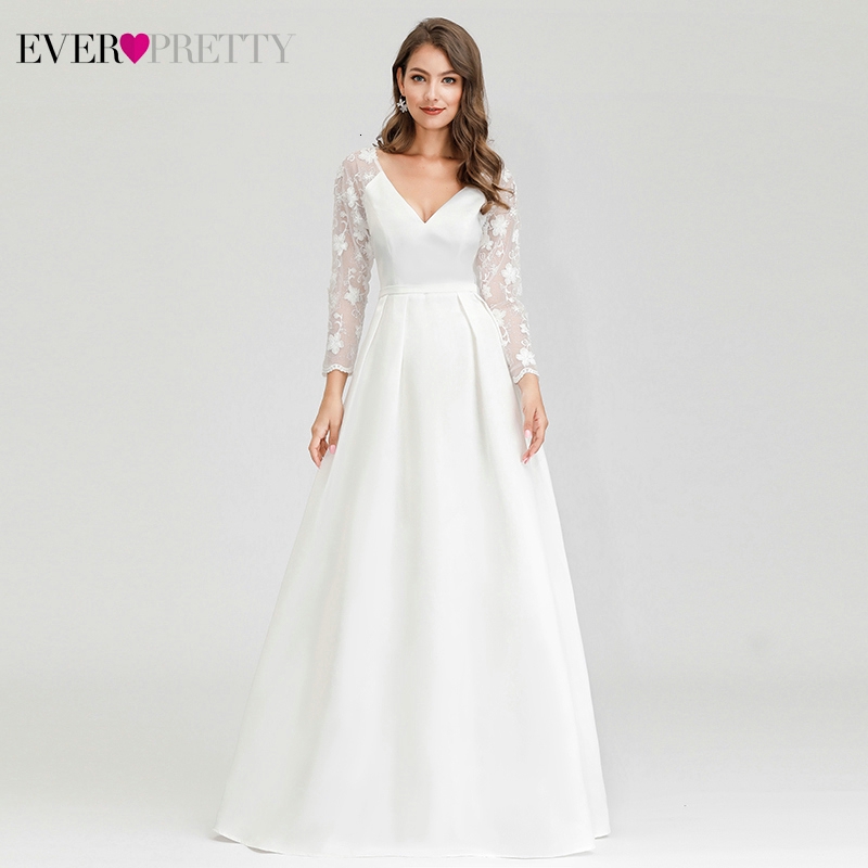 white lace wedding dress with sleeves