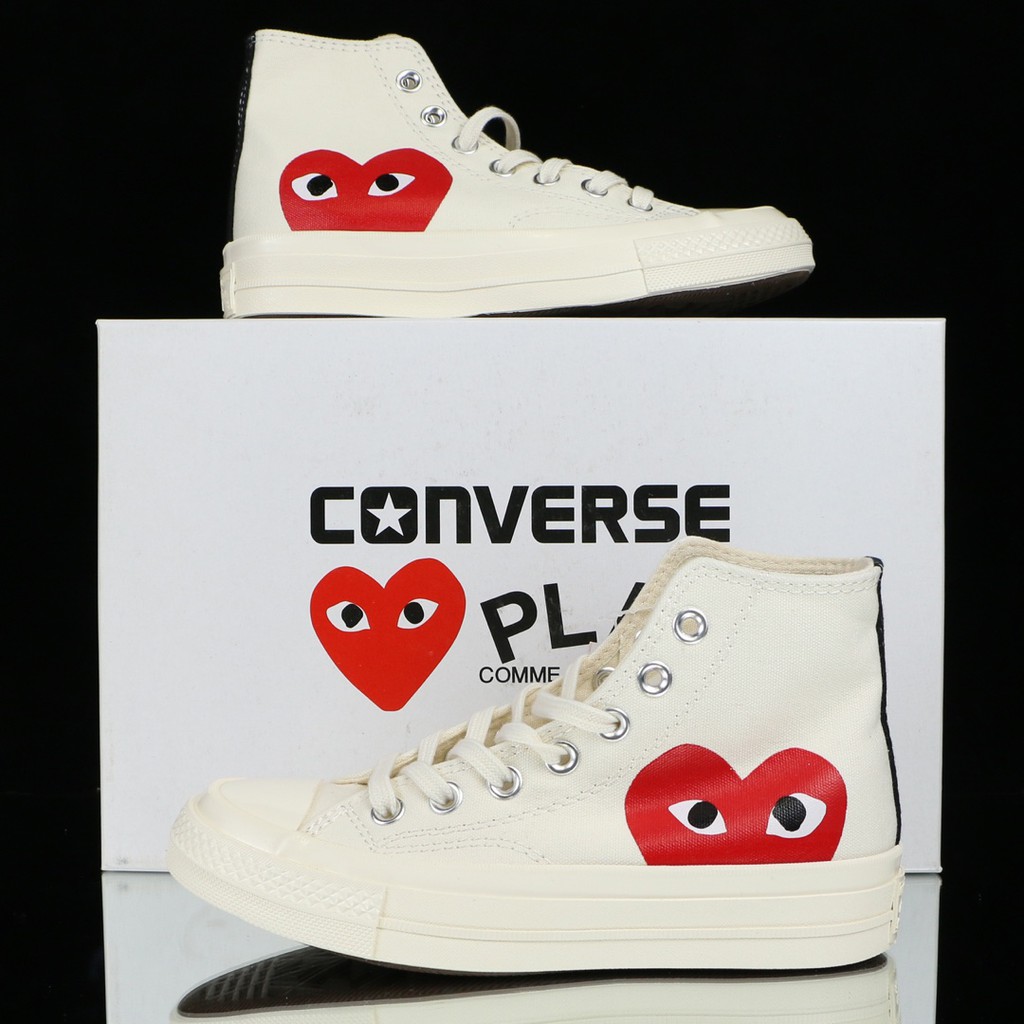 converse with red heart on side