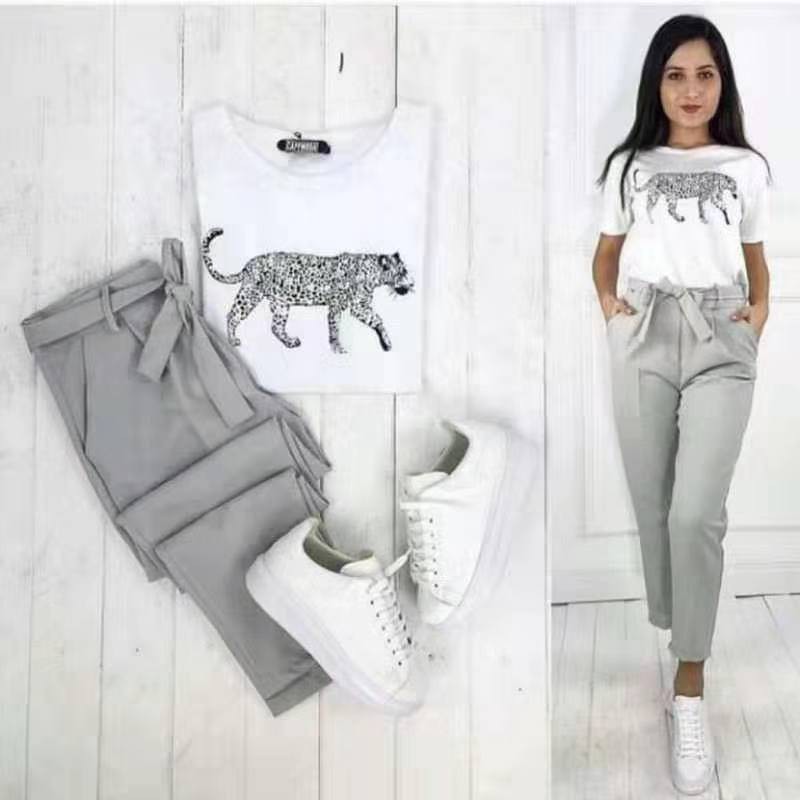 white top grey pants