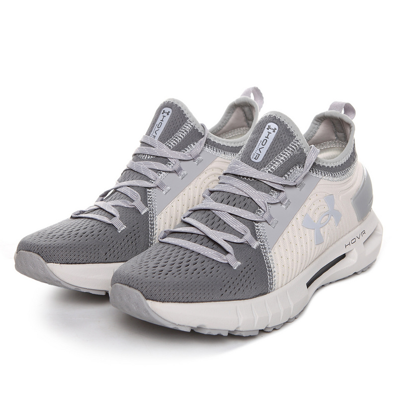 gray and white under armour shoes