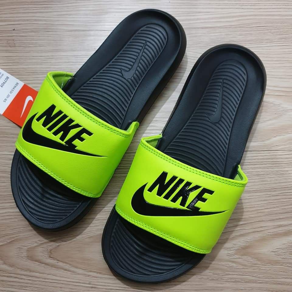 neon yellow nike slides