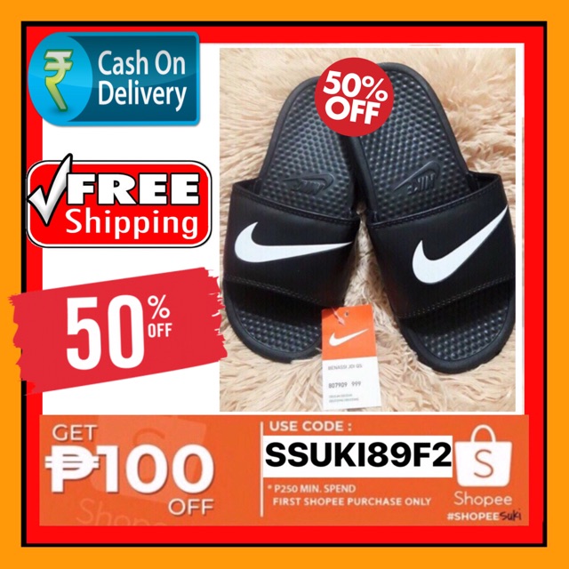 buy nike slippers at 50 off