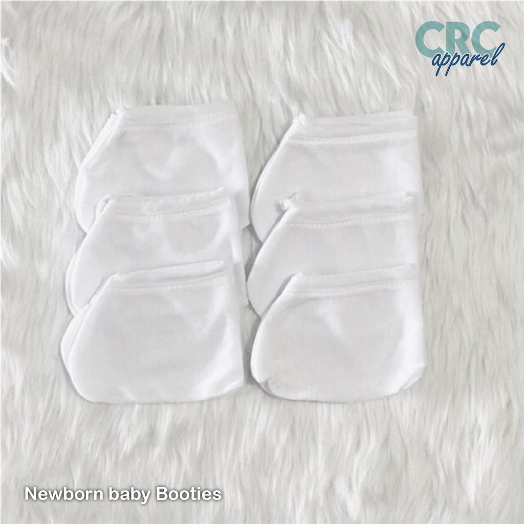 white newborn booties