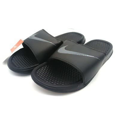 grey and black nike slides