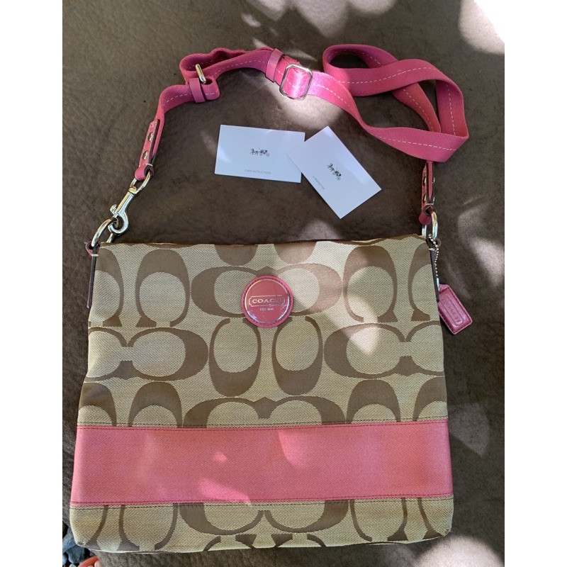 coach pink sling bag