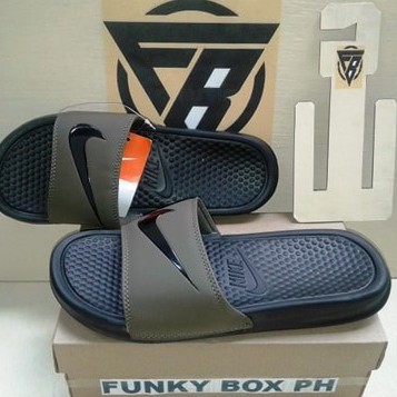 green nike benassi slides