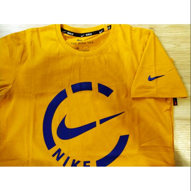 mustard nike t shirt