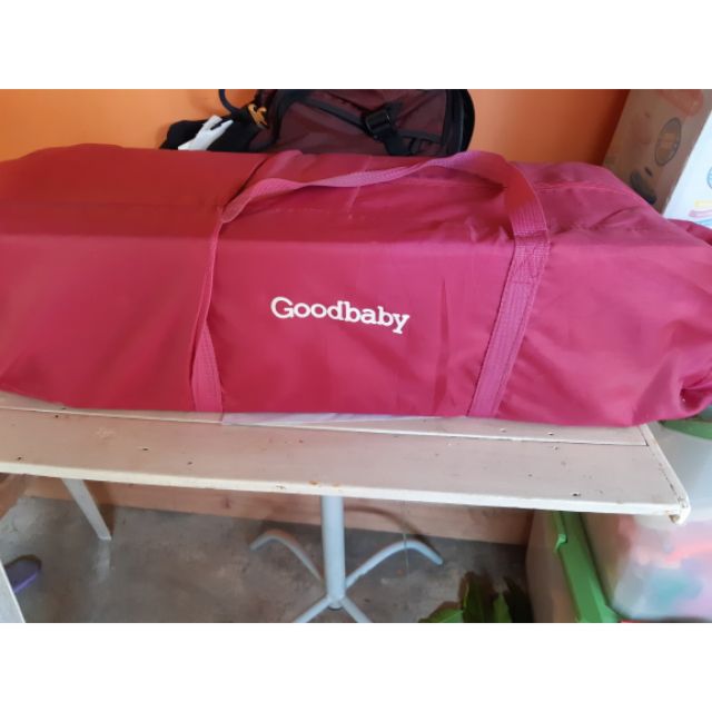 red baby bassinet