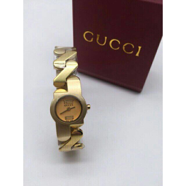 gucci zig zag gold watch price