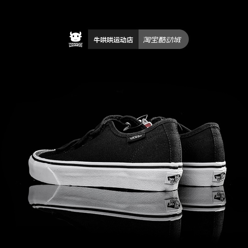 all black vans with white sole