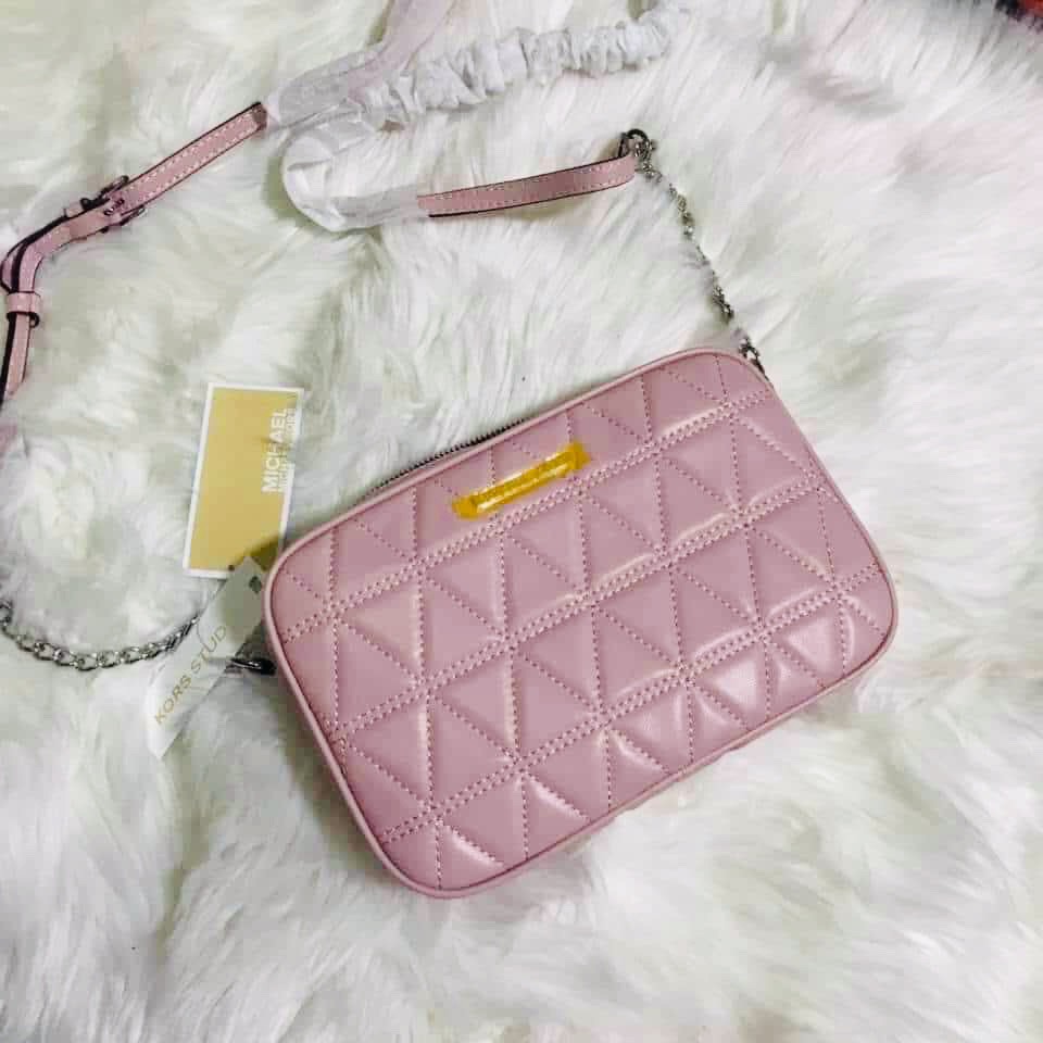 mk pink sling bag