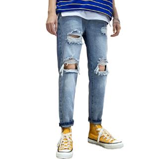 jeans with torn ankles
