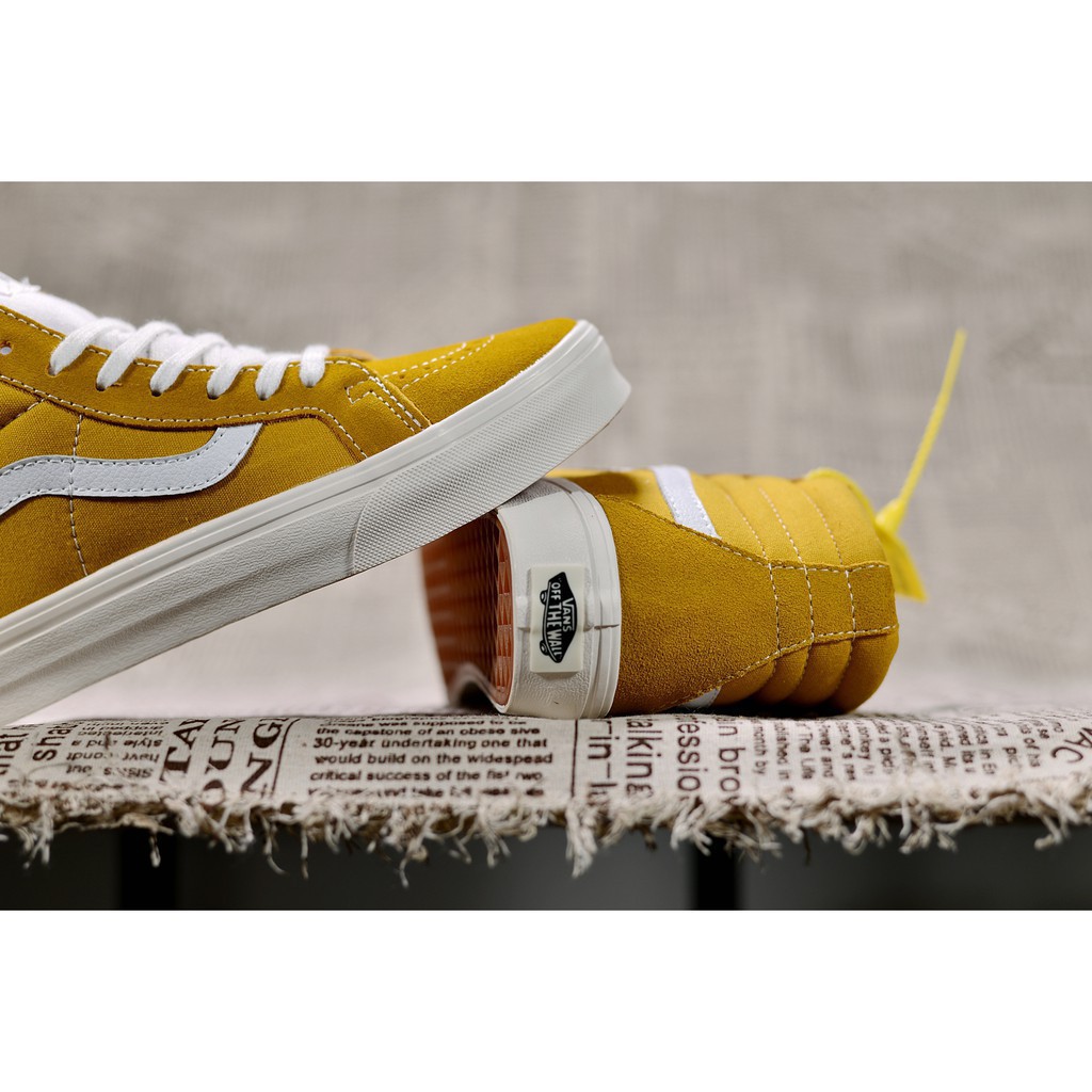 yellow and black vans high tops